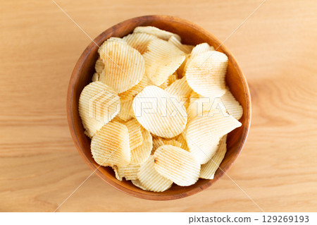 Potato chips on the table 129269193