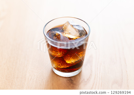 Cola on the table Cola on the table 129269194
