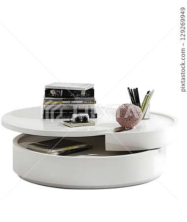 White coffee table with a round shape and a pink sphere on top of it 129269949