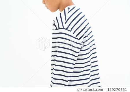 Hunchbacked elementary school boy 129270561