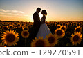 The shadows of two people blooming at dusk 129270591