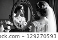 A silent vow reflected in the mirror 129270593