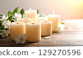 Warmth shining in the white flowers 129270596