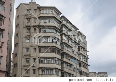 Aug 3 2025 the Urban Apartment Building Exterior with Numerous Windows Aug 3 2025 the Urban Apartment Building Exterior with Numerous Windows 129271015