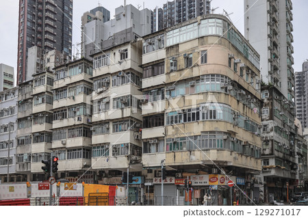 Aug 3 2025 Urban Apartment Building Exterior with Numerous Windows Aug 3 2025 Urban Apartment Building Exterior with Numerous Windows 129271017