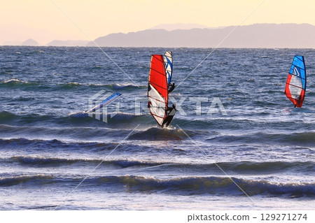Surfing at Fukuma Beach 129271274