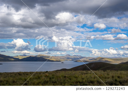 Storm clouds over Lake Lagunillas in the Peruvian highlands Storm clouds over Lake Lagunillas in the Peruvian highlands 129272243
