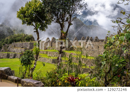 Panoramic view of Machu Picchu ruins with Huayna Picchu in background, Peru Panoramic view of Machu Picchu ruins with Huayna Picchu in background, Peru 129272246