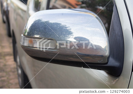 Rear View of Side Mirror with Soft Sunlight Rear View of Side Mirror with Soft Sunlight 129274003