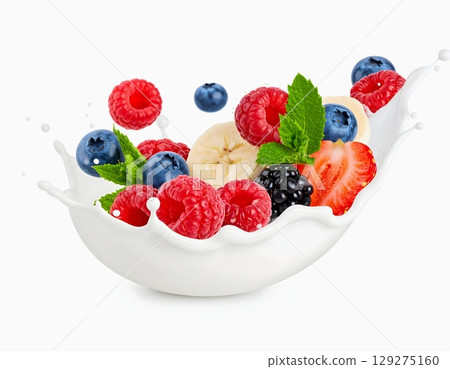 Fresh mixed berries splash into milk vibrant strawberries, raspberries, blueberries, and blackberries with mint leaves isolated on white background Fresh mixed berries splash into milk vibrant strawberries, raspberries, blueberries, and blackberries with mint leaves isolated on white background 129275160