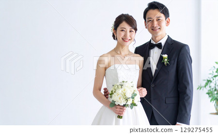 Bride and groom holding wedding bouquet wedding photo Bride and groom holding wedding bouquet wedding photo 129275455