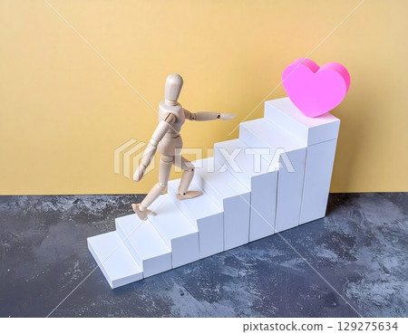 A drawing doll's journey towards the goal of love 129275634