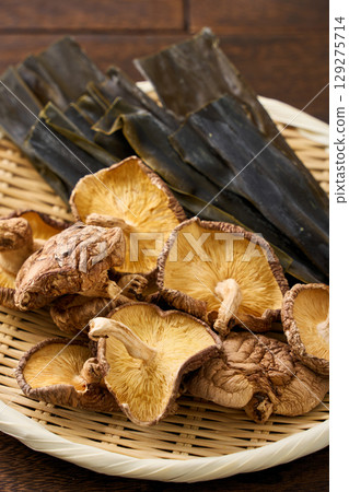 Dried Shiitake Mushrooms and Kombu Seaweed | Dried ingredients used as dashi in Japanese cuisine Dried Shiitake Mushrooms and Kombu Seaweed | Dried ingredients used as dashi in Japanese cuisine 129275714