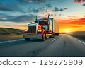 Classic American long-nose semitruck on a highway 129275909