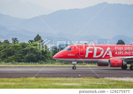 An airplane running on the runway at Mt. Fuji Shizuoka Airport in Makinohara City (Shizuoka Prefecture) An airplane running on the runway at Mt. Fuji Shizuoka Airport in Makinohara City (Shizuoka Prefecture) 129275977