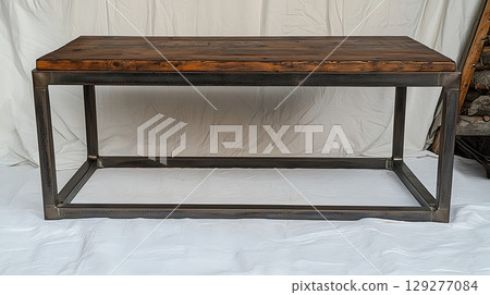 Wooden table with a metal frame 129277084