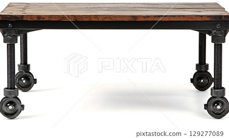 Wooden table with four wheels on the bottom Wooden table with four wheels on the bottom 129277089