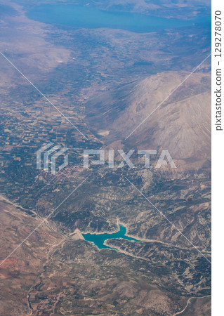 beautiful mountain landscape on high rocks from the height of the flight of the plane beautiful mountain landscape on high rocks from the height of the flight of the plane 129278070