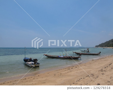 fishing motor boats moored on the sea coast fishing motor boats moored on the sea coast 129278318