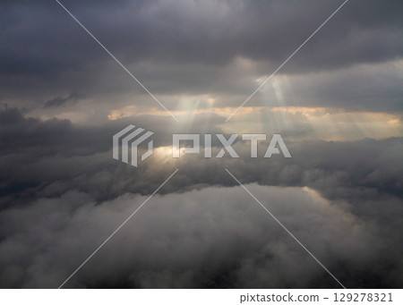 beautiful thick clouds in the sky from the height of the plane 129278321