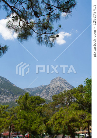 beautiful landscape of rocky mountains against blue sky beautiful landscape of rocky mountains against blue sky 129278415