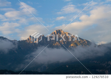beautiful landscape of rocky mountains against blue sky beautiful landscape of rocky mountains against blue sky 129278510