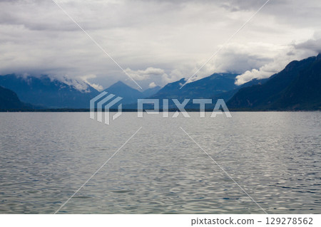 beautiful seascape on the horizon silhouette of mountains 129278562