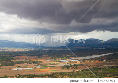 landscape of the stormy sky over the city 129278704