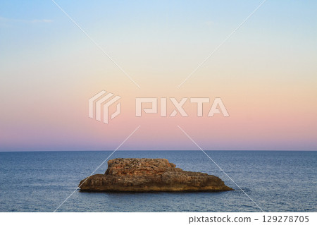 beautiful seascape on the horizon silhouette of mountains beautiful seascape on the horizon silhouette of mountains 129278705