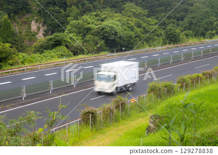 Stock photo of cars driving on the highway Stock photo of cars driving on the highway 129278838