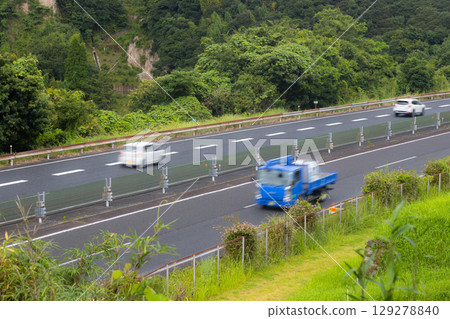 Stock photo of cars driving on the highway Stock photo of cars driving on the highway 129278840