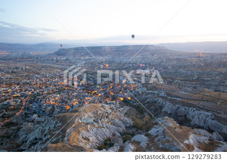 beautiful scenery flight of balloons in the mountains of Cappadocia in love valley beautiful scenery flight of balloons in the mountains of Cappadocia in love valley 129279283