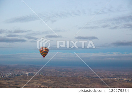 beautiful scenery flight of balloons in the mountains of Cappadocia in love valley 129279284