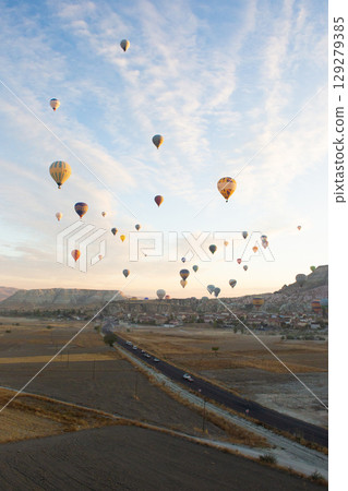 beautiful scenery flight of balloons in the mountains of Cappadocia in love valley 129279385