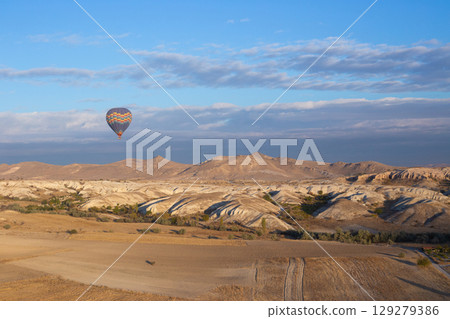 beautiful scenery flight of balloons in the mountains of Cappadocia in love valley beautiful scenery flight of balloons in the mountains of Cappadocia in love valley 129279386