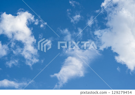 beautiful thick white clouds in the blue sky beautiful thick white clouds in the blue sky 129279454