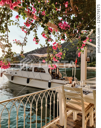 beautiful interior of a restaurant on the seashore beautiful interior of a restaurant on the seashore 129279575