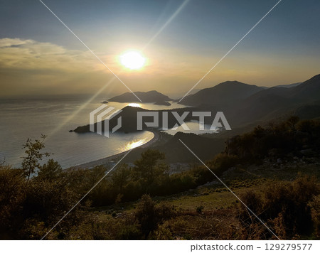 beautiful landscape from babadag mountain to Oludeniz beach in Turkey beautiful landscape from babadag mountain to Oludeniz beach in Turkey 129279577