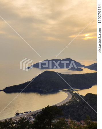 beautiful landscape from babadag mountain to Oludeniz beach in Turkey beautiful landscape from babadag mountain to Oludeniz beach in Turkey 129279584