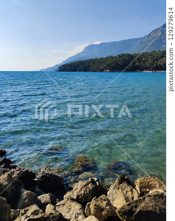 beautiful landscape of the sea against the background of mountains beautiful landscape of the sea against the background of mountains 129279614