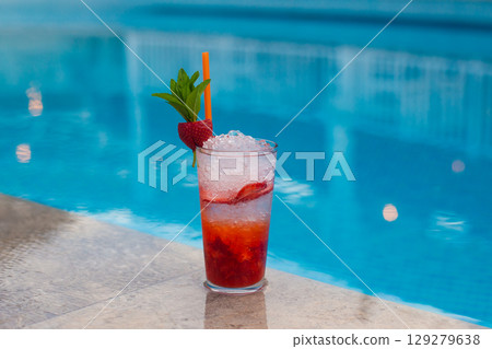 close up of a beautiful fruity alcoholic cocktail 129279638