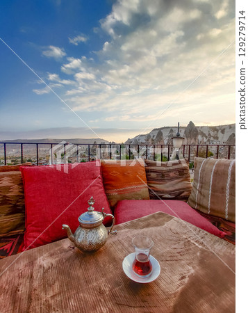 traditional turkish black tea on table with teapot 129279714