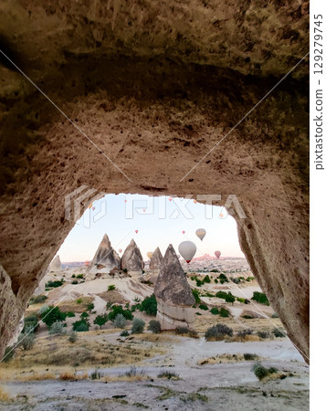 beautiful scenery flight of balloons in the mountains of Cappadocia in love valley 129279745