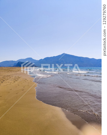 beautiful landscape of a sandy beach on the sea 129279760