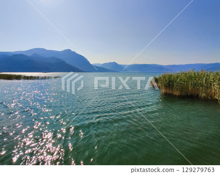 beautiful landscape of the lake against the background of mountains 129279763