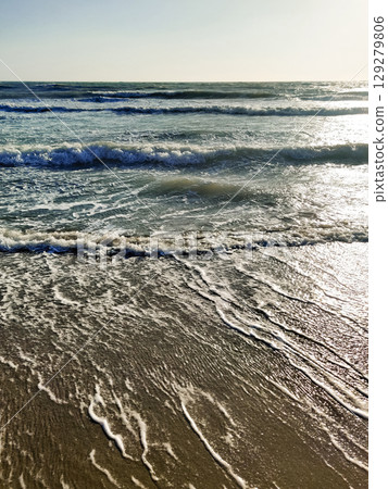 beautiful landscape of a sandy beach on the sea 129279806