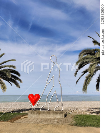 a sculpture with a heart on the beach by the sea in the city of Batumi Georgia 129280000