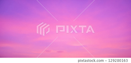 Minimalist abstract background colorful sky gradient over a dark horizon, showing beautiful transition from purple to pink and orange 129280163