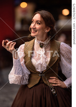 beautiful woman scientist in retro style with smoking pipe beautiful woman scientist in retro style with smoking pipe 129280675