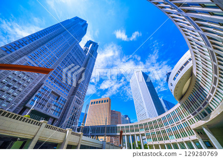 Tokyo cityscape, Japan, August 5th. Extremely hot... View of Tokyo Metropolitan Government Building... A ray of hope for a new era... Tokyo cityscape, Japan, August 5th. Extremely hot... View of Tokyo Metropolitan Government Building... A ray of hope for a new era... 129280769